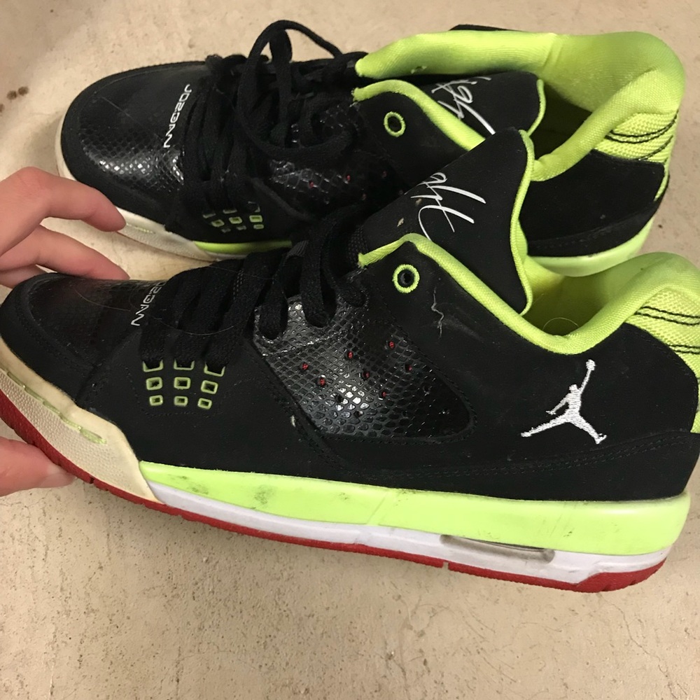 Green, red, white and black jordan flights.
